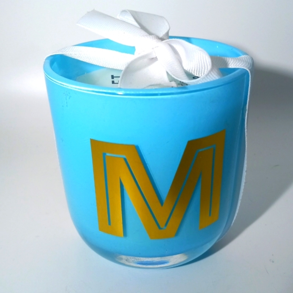CANDAL WITH GOLD M INITIAL